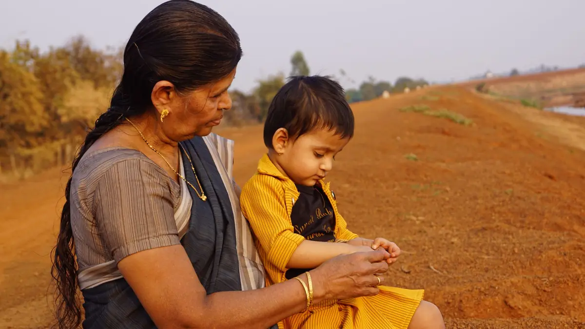 Photo: A grandmother and her grandson sharing a moment in a rural area near Raipur, India.