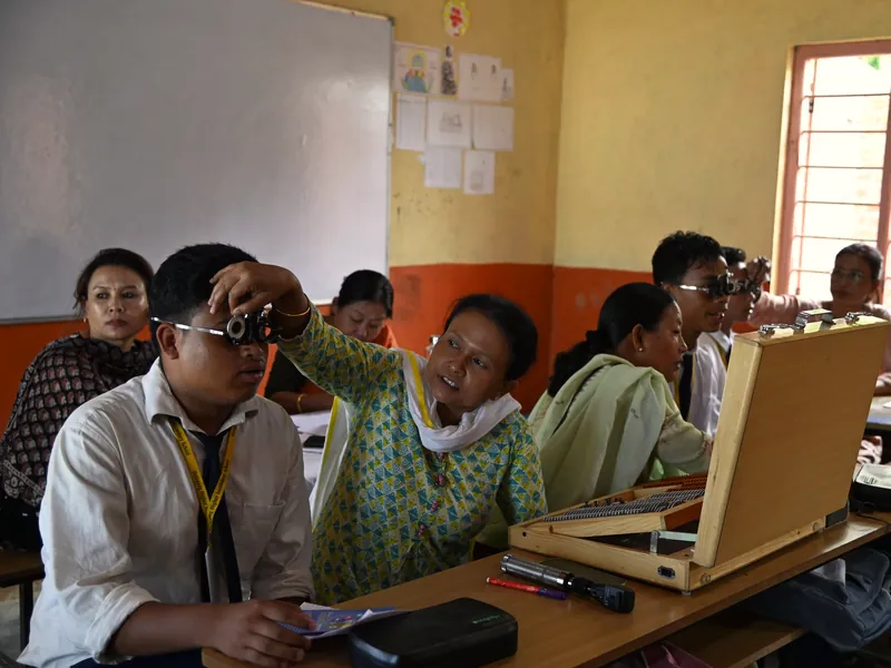 Illustrative scene: a vision screening session for school children